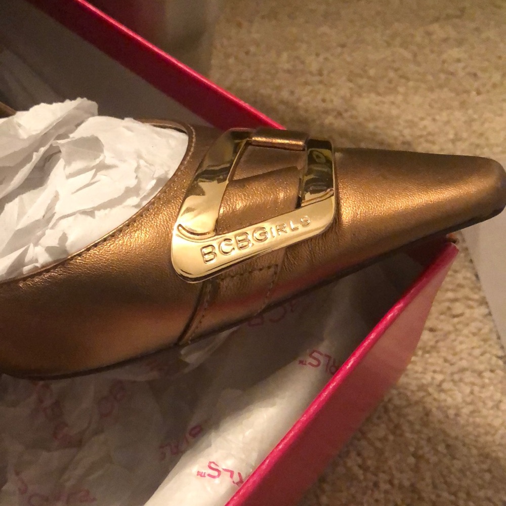Four inch kid leather bronze lady’s heel.  Lined upper inner sole padded. Sharp!